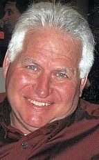 Obituary of Daniel E. Reynolds III