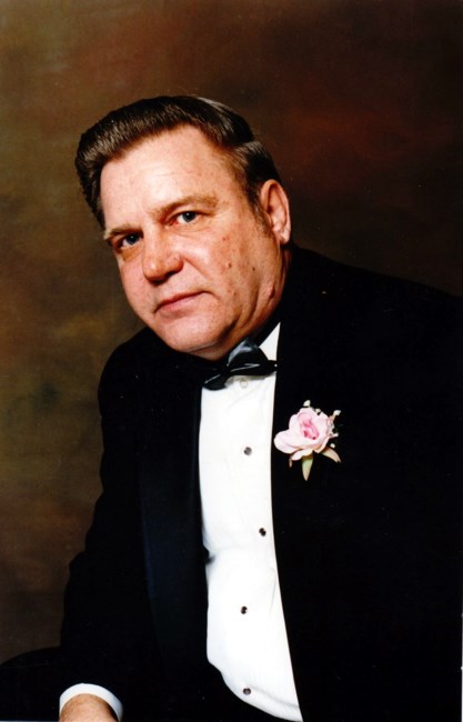 Obituary of John "Budd" Holland Jr.