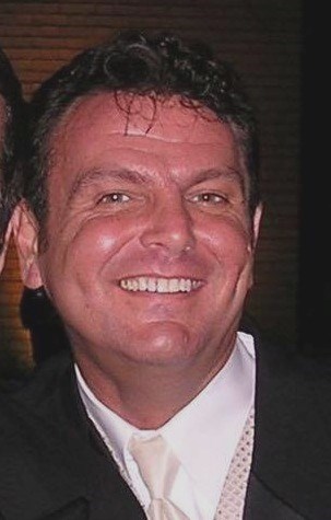 Obituary of Eugene T. Carlin