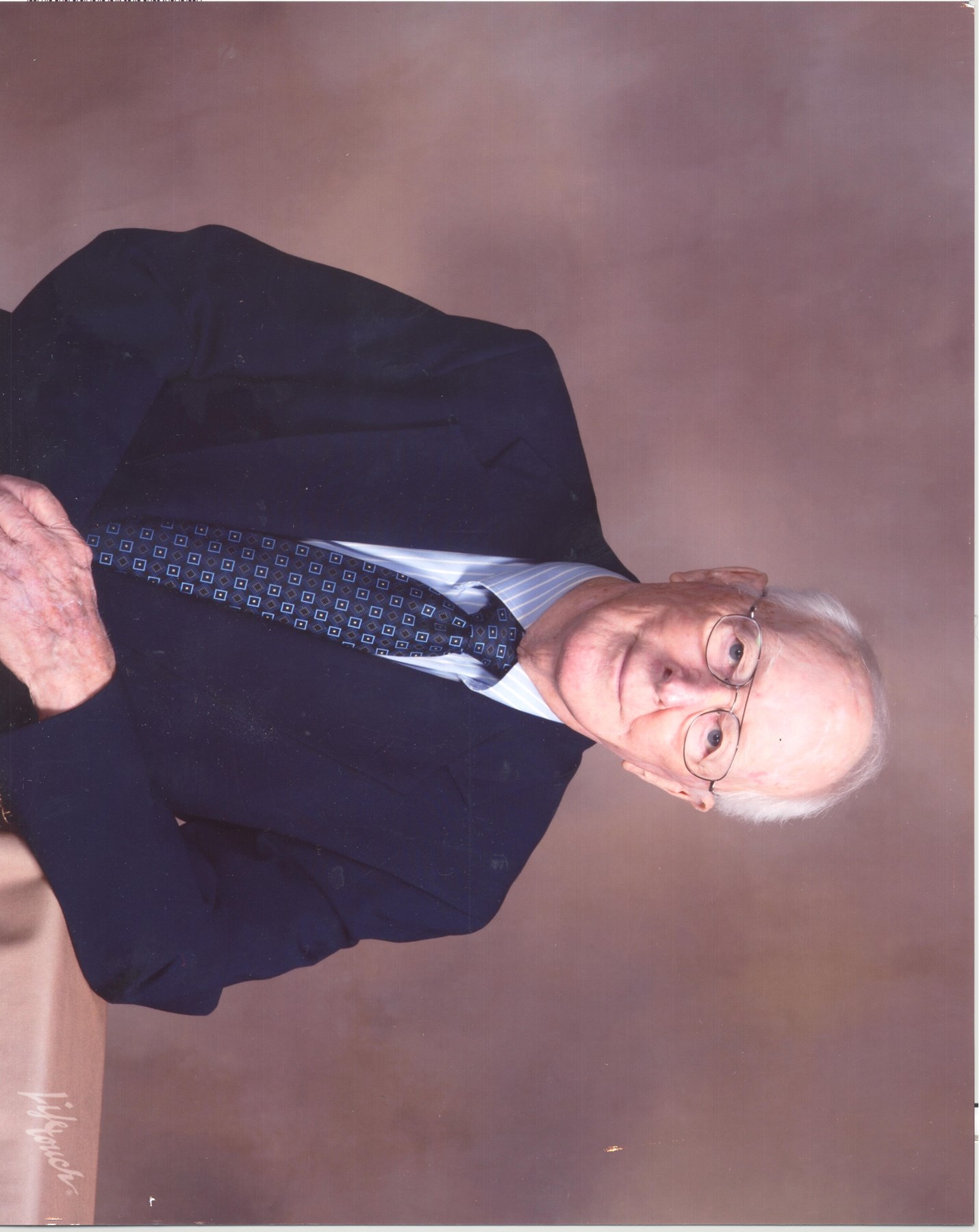 Obituary of George G Harrington