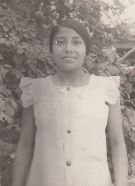 Obituary of Maria M. E. Benitez