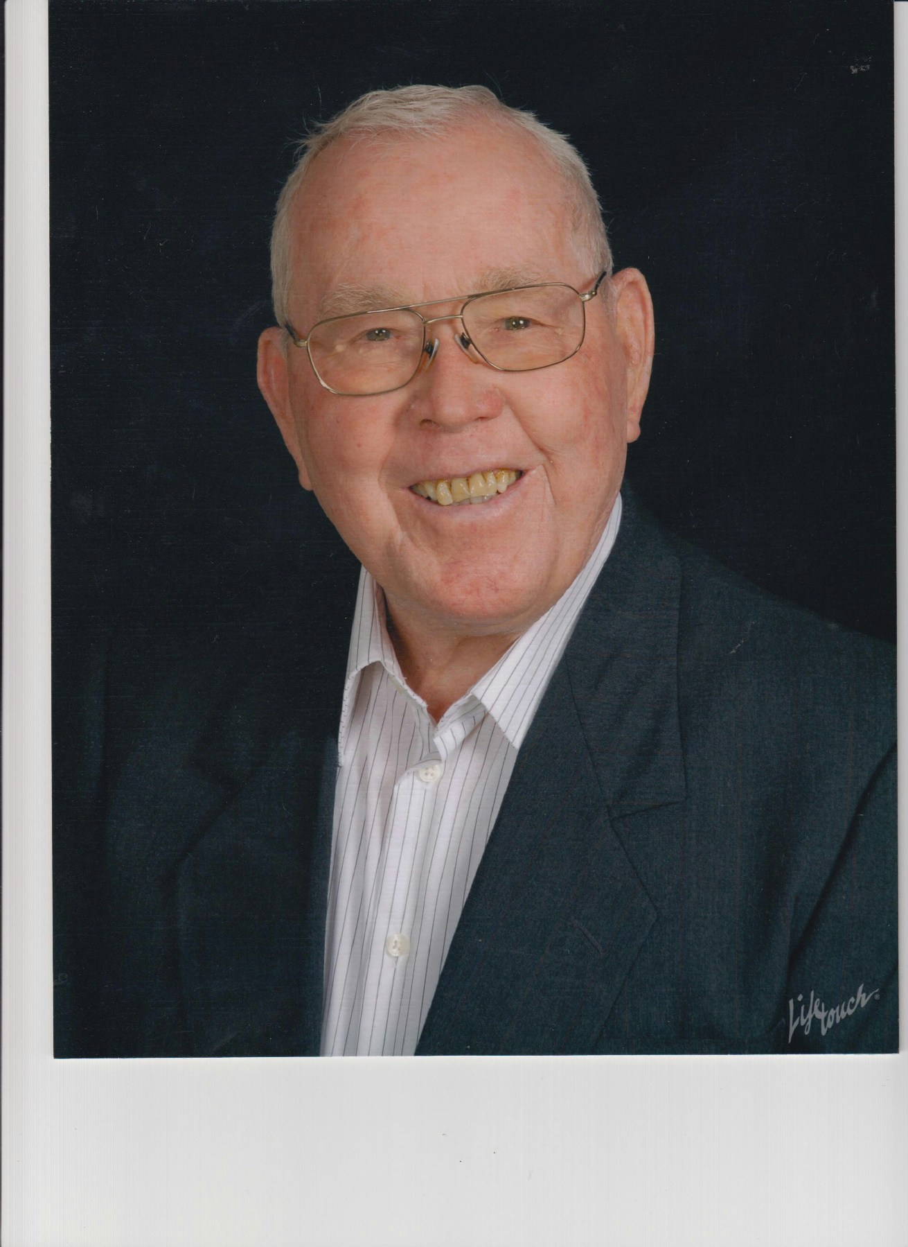 Obituary of Robert J. LeRoy