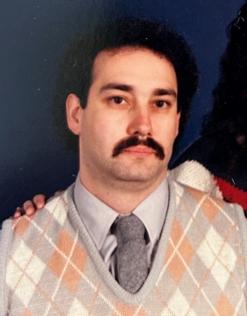 Obituary of Dr. Mark H. Comensky Ph.D.