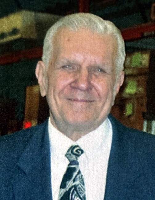 Obituary of John R. Stauss